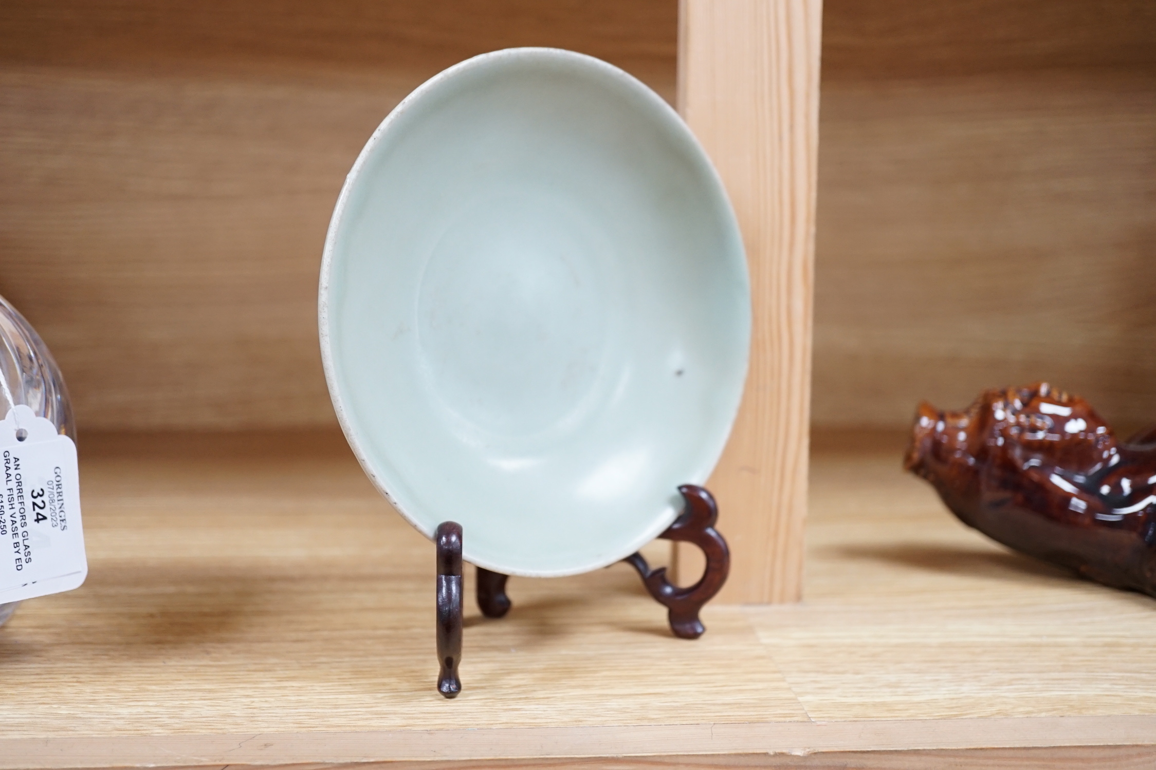 A Chinese Celadon dish and stand, 16cm diameter